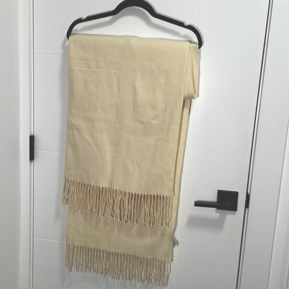 Large and long cream scarf.